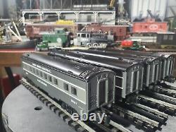 Ensemble de 4 wagons Lionel New York Central à l'échelle O pour votre circuit de train.