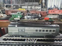 Ensemble de 4 wagons Lionel New York Central à l'échelle O pour votre circuit de train.
